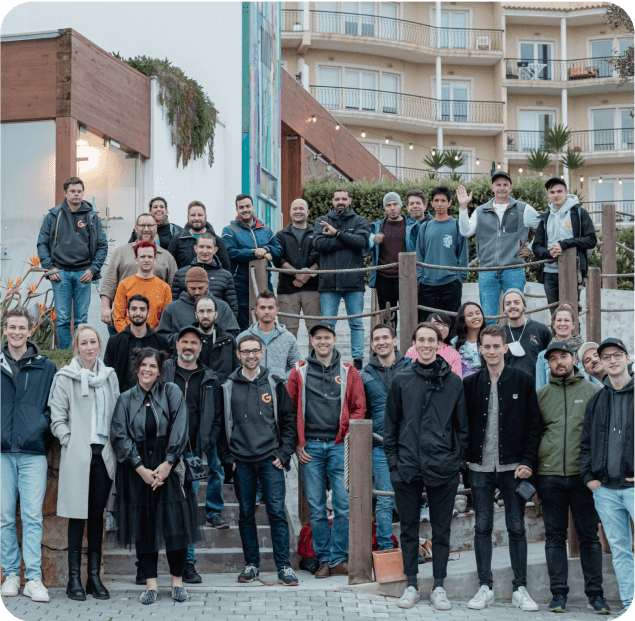 Gitpod team on stairs for a group photo.