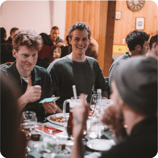 Gitpod team members on eating table.